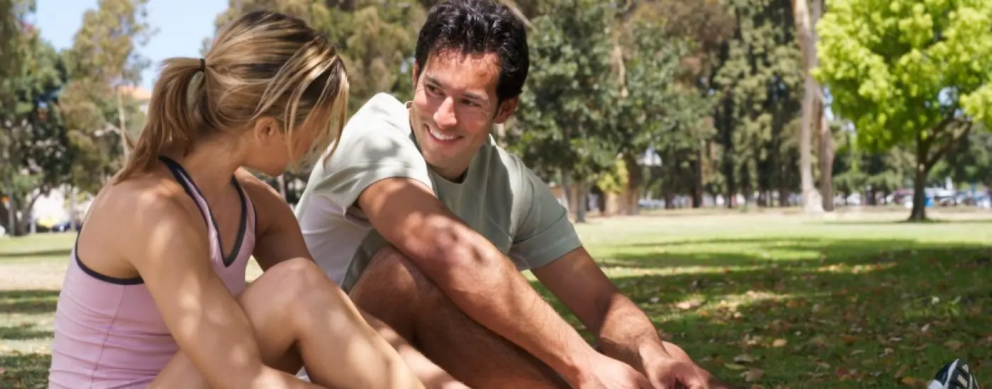 active-couple-resting-outdoors-after-exercise-2026-09-24-20-05-27-utc